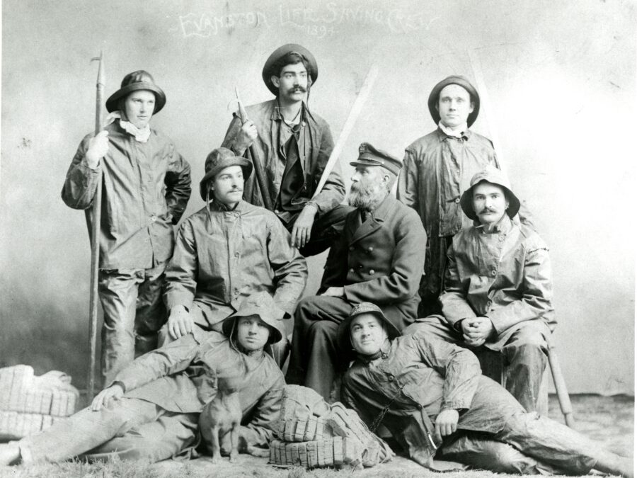 1894 posed photograph of Keeper Lawson surrounded by his NWU student surfmen.