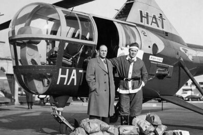 Photo: Flying Santa poses next to Sikorsky S-51.