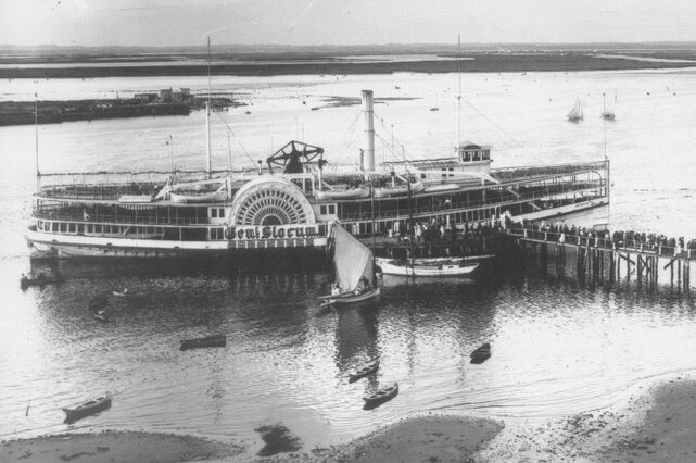 Black and white photography of the Steamer General Slocum, a sidewheel passenger steamboat built in Brooklyn, New York, in 1891. Image taken before fire and sinking disaster that occurred on June 15, 1904. It is the worst maritime disaster of the 20th century until the Titanic surpassed it a few years later in 1912.