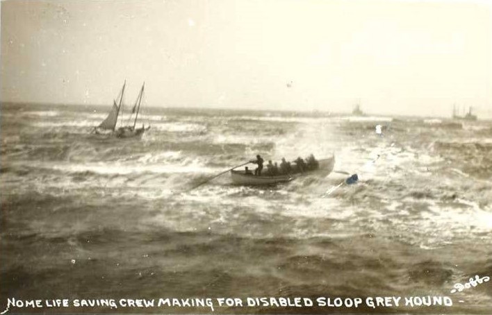 Photo: Rescue boat battles violent waters. Handwritten caption: