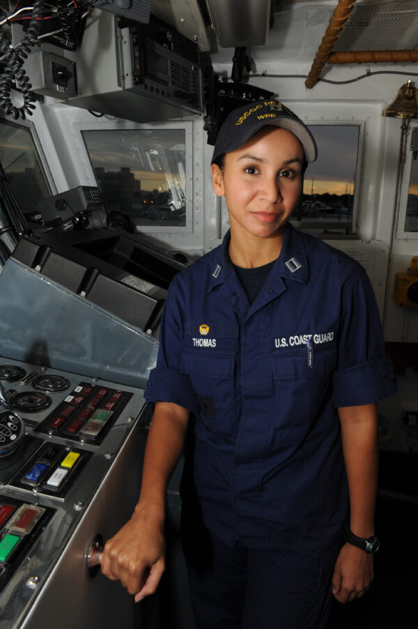 Photo: LT Felicia Thomas at the controls of her cutter.