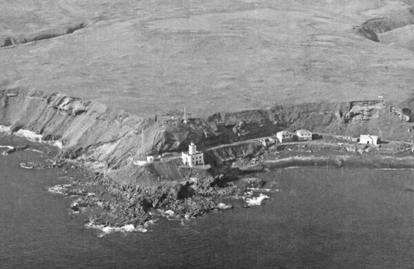 Aerial photo of Scotch Cap Lighthouse taken before the 1946 tsunami.